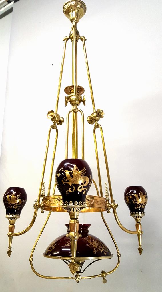 Rare C 1870's Gas Chandlier w/ Griffin Glass: Rare C 1870's Gas Chandlier w/ Griffin Cased Glass - Gasolier has 3 maroon shades up and 1 maroon 10" shade down cast. Hgt overall is 48" Dia. 28". Polished and electrified. All glass in good conditio