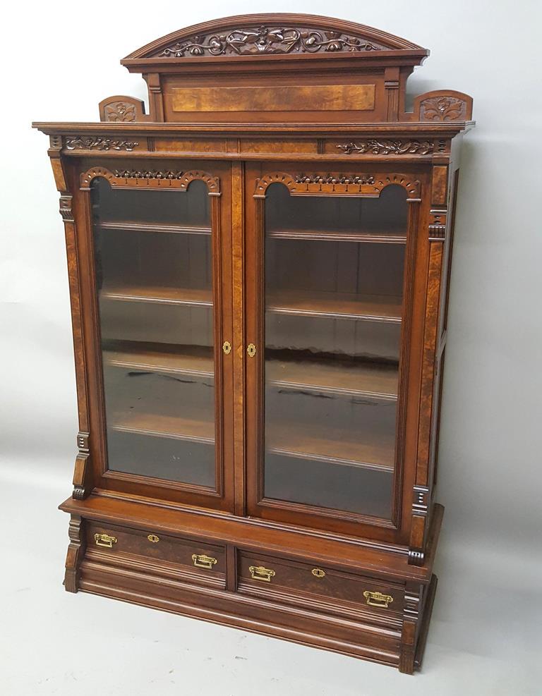 C 1880's Carved Burl Walnut Bookcase with Original: C 1880's Carved Burl Walnut Bookcase with Original Brass Hardware - good old refinished condition. Hgt 77" w 51" d 19". Found in Minnetonka MN estate. I sold this bookcase 30 years ago.
