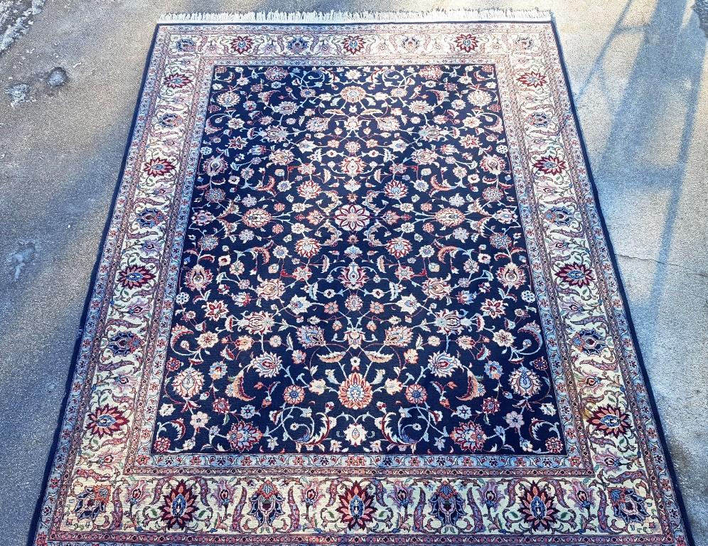 Hand Tied Oriental Rug in Navy, beige, and wine. 8 feet: Hand Tied Oriental Rug in Navy, beige, and wine. 8 feet x 10 feet. Good condition.