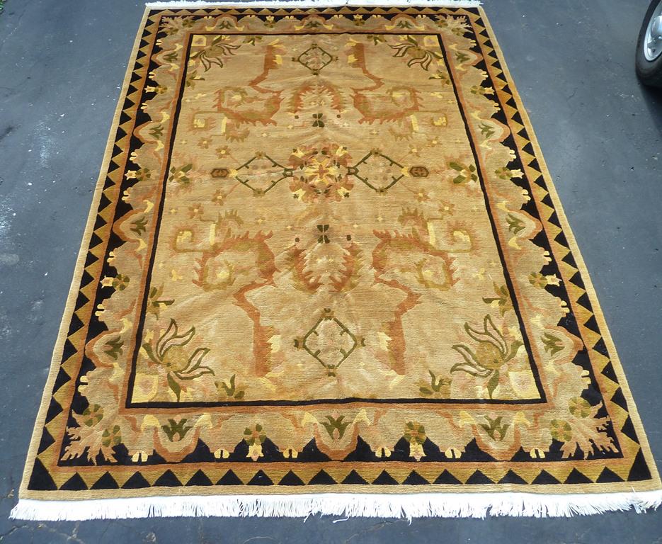 Turkish Handtied Oriental Wool Rug - Having stylized: Turkish Handtied Oriental Wool Rug - Having stylized leaf and flower motif in autumn color tones - 9 feet x 12 feet, Good condition.