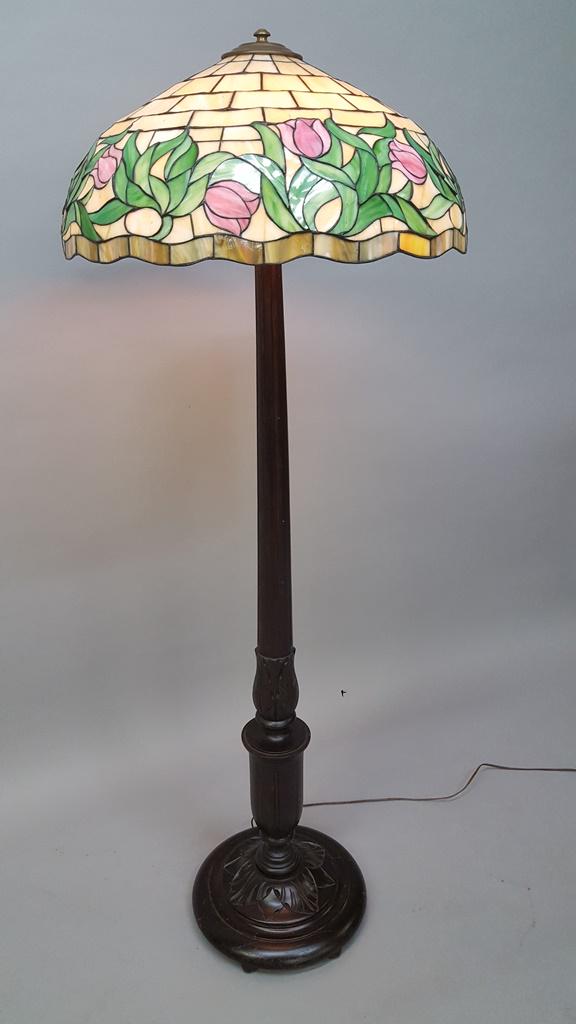 Circa 1920's Leaded Glass Floor Lamp with carved 5: Circa 1920's Leaded Glass Floor Lamp with carved 5 socket wooden base - Hgt 66" dia. Of antique leaded shade 24". Good condition overall. Some hairlines in floral edge.