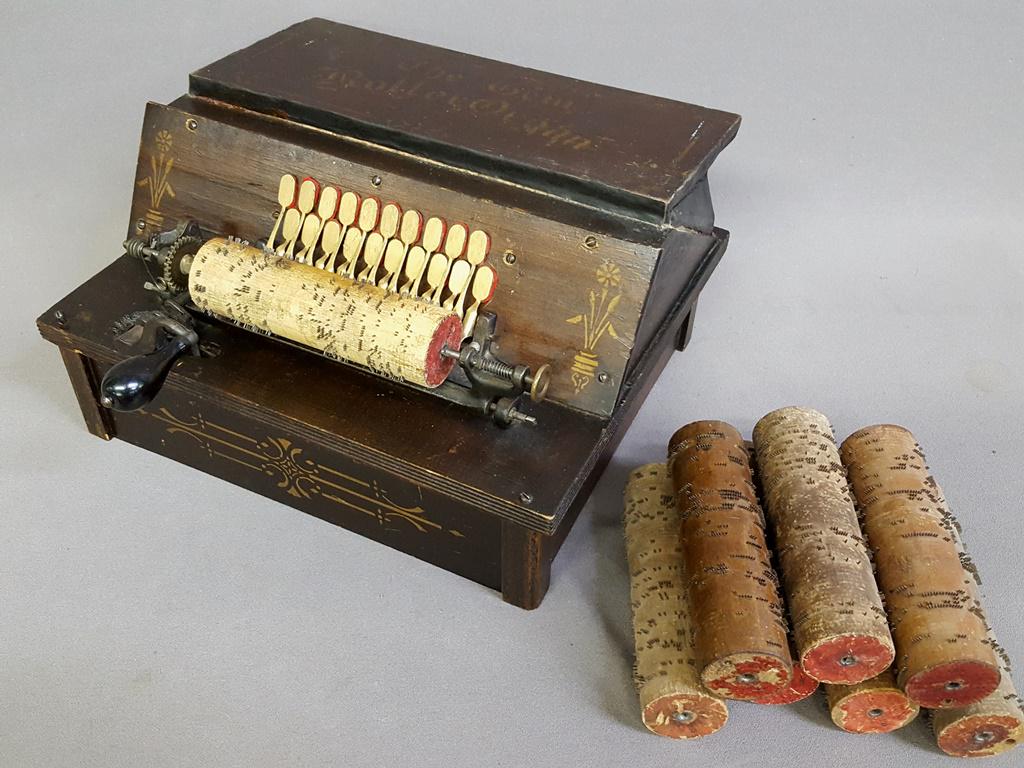 Marked (The Gem Roller Organ) Circa 1880's. Has: Marked (The Gem Roller Organ) Circa 1880's. Has orginal finish and gold stenciling. Plays. W 14.5" d 12" h 8". Found in Elgin MN home. Directions on paper under the base on the bellows.
