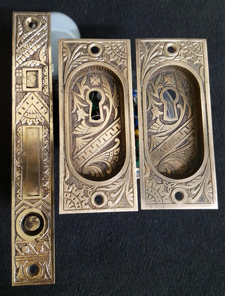 Circa 1880's Brass Eastlake Lockset with Handles - hgt: Circa 1880's Brass Eastlake Lockset with Handles - hgt of lock face 7.5" w 1 1/16". Two door handles for lock. H 4 7/8" w 2". Good condition.