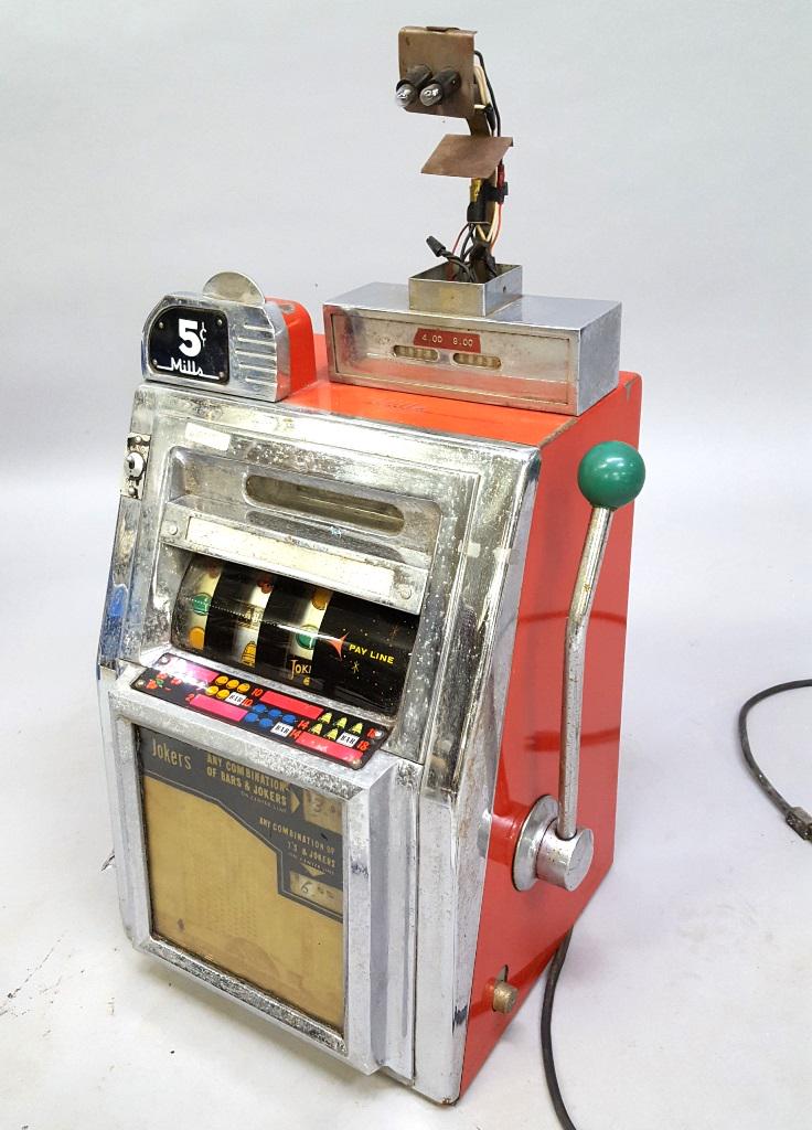Mills 5 Cent Slot machine - this is a mechanical slot: Mills 5 Cent Slot machine - this is a mechanical slot machine. Cord just light things up. Good working condition. From mid to late 1950's. hgt 28" w 17" d 13". Found in St Paul Mn estate.