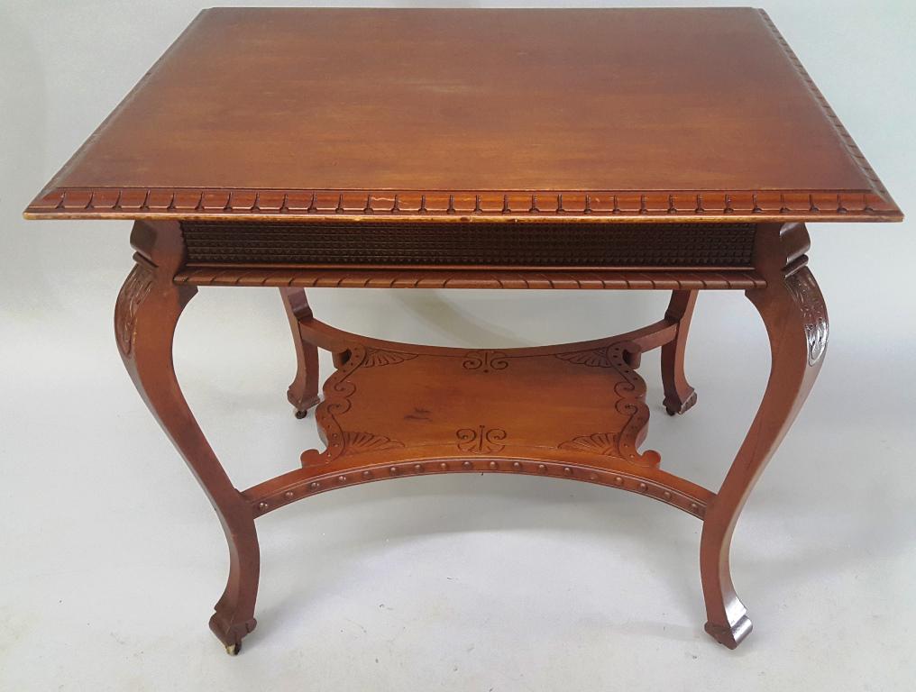 Circa 1890's Carved Wooden Table with Line decoration.: Circa 1890's Carved Wooden Table with Line decoration. Hgt 30" w 32" d 24". Solid condition retaining the original finish. Found in St Paul MN home.