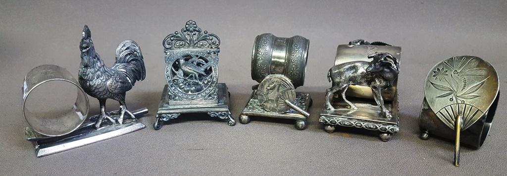 Group of 5 circa 1900 Silverplate napkin rings -: Group of 5 circa 1900 Silverplate napkin rings - Largest is rooster on left - hgt 3.5" w 4" smallest is fanon the right - hgt 2.5" w 2". All in good condition. Signed by the makers.