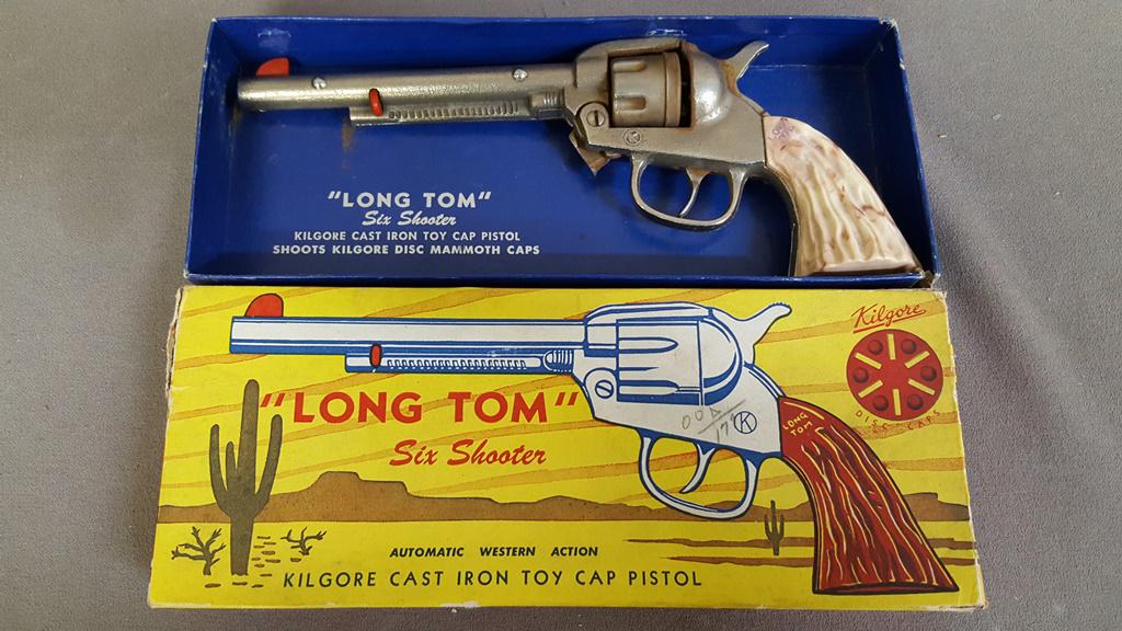 Long Tom Kilgore Cast Iron Six Shooter Cap Pistol -: Long Tom Kilgore Cast Iron Six Shooter Cap Pistol - original box - length 10.5" w 4.5" h 1.5". Very good condition. Found in Balsam Lake WI estate.