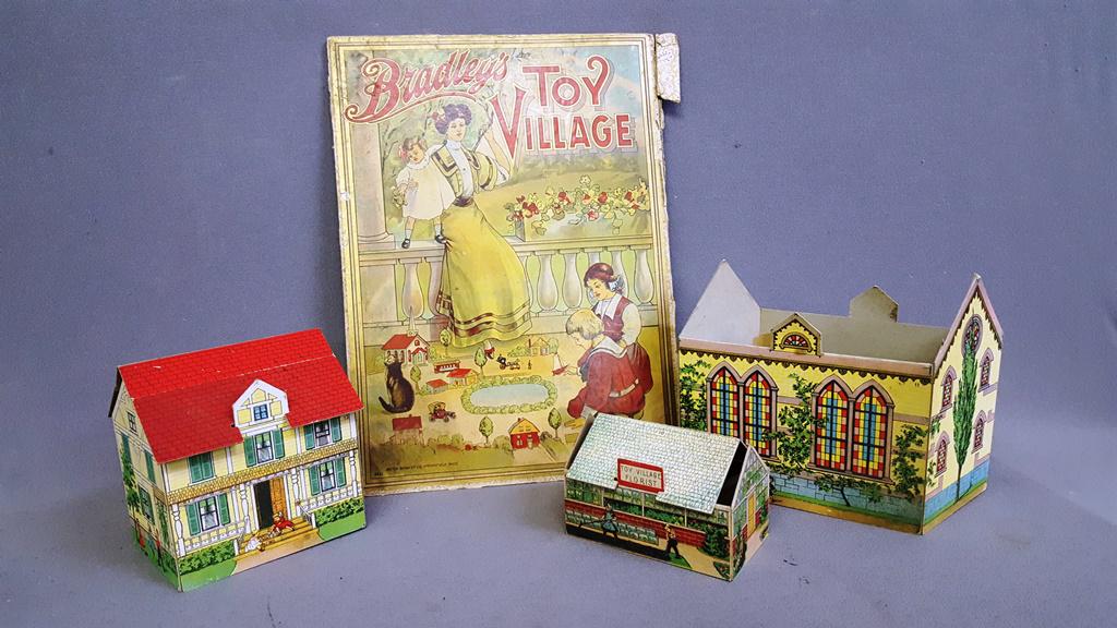 Bradley's Toy Village - Milton Bradley Co. Springfield: Bradley's Toy Village - Milton Bradley Co. Springfield Mass. Overall cover size 15" x 11". Paper church is 7" high. House is 6" high. Florist is 3.25" high. One paper roof is missing. We only have the