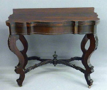 EARLY ROSEWOOD AMERICAN SWIVEL TOP GAMES TABLE W/CA: EARLY ROSEWOOD AMERICAN SWIVEL TOP GAMES TABLE W/CARVED BASE- H 30" W 34"- CIRCA 1860