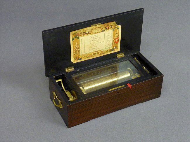 17" ANTIQUE SWISS MUSIC BOX WITH ORIGINAL SONG LIST: 17" ANTIQUE SWISS MUSIC BOX WITH ORIGINAL SONG LIST of 10 TUNES IT PLAYS - DATED 1876