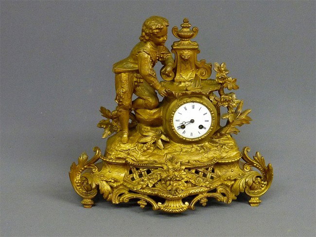ORNATE GILT STATUE CLOCK OF BOY SAILING BOAT signe: ORNATE GILT STATUE CLOCK OF BOY SAILING BOAT signed(PH MOUREY dated 1855 JAPY FRERES) -H 15" W 17"