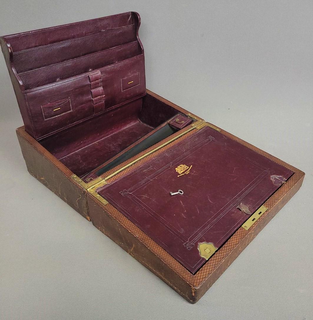 Circa 1880's Leather covered Lap Desk with leather covered ink wells.  Signed London on the lock. (1 of 8)