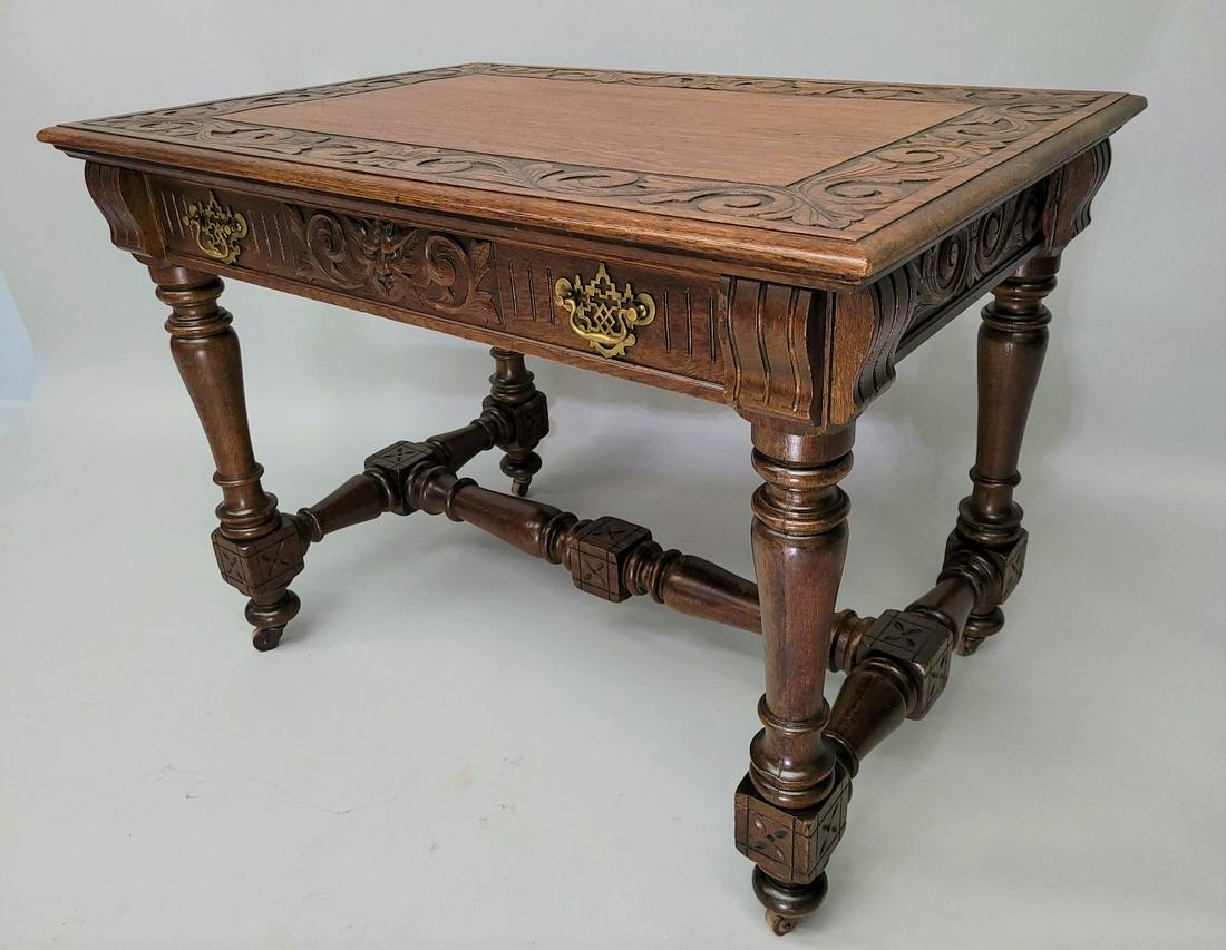 Circa 1880's Heavily Carved Oak Desk or Library Table with drawer. Has original over coated finish. (1 of 5)