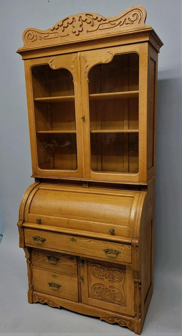Circa 1900 solid oak Cylinder Roll Top Secretary with incut carved decoration. Comes in 2 parts for (1 of 6)