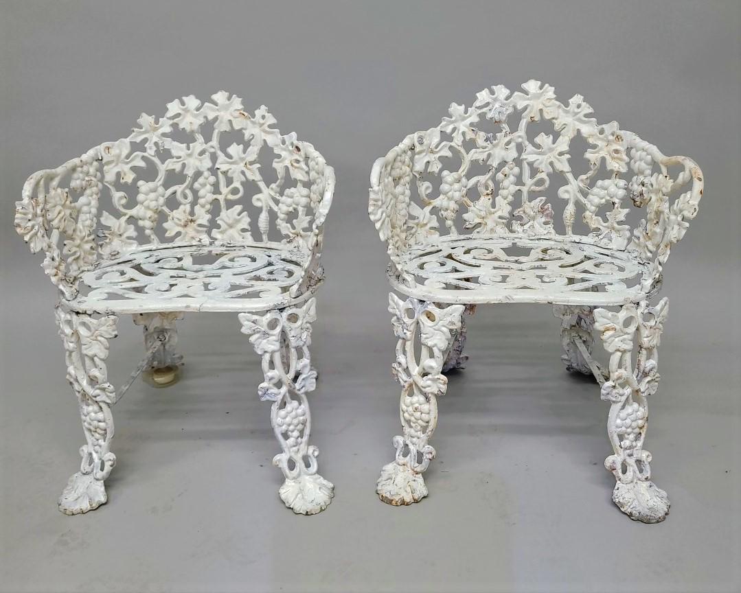 Early 20th Century cast iron Pair of Grape & Leaf Garden Chairs - hgt 25" w 21 d 17". Found in: Early 20th Century cast iron Pair of Grape & Leaf Garden Chairs - hgt 25" w 21 d 17". Found in Superior WI estate.