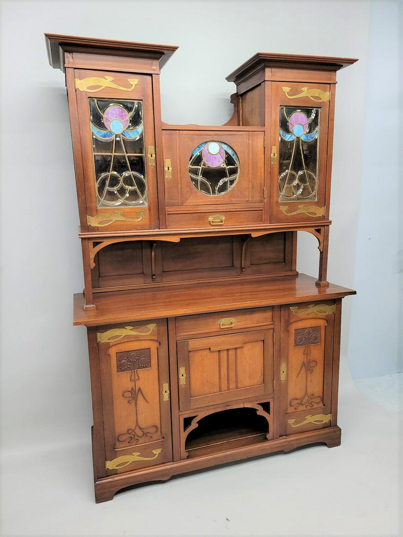 Circa 1910 Art Nouveau Leaded Glass Display Cupboard - hgt 90" w 62.5" d 23.5". Good carved mahogany: Circa 1910 Art Nouveau Leaded Glass Display Cupboard - hgt 90" w 62.5" d 23.5". Good carved mahogany with original hardware & leaded glass. Good original finish.Comes in 3 parts for easier hauling. Fo