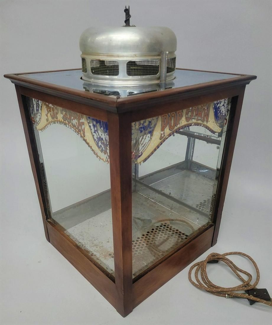 Circa 1930's electric Popcorn Machine with original paint advertising on each of the glass. Good (1 of 4)