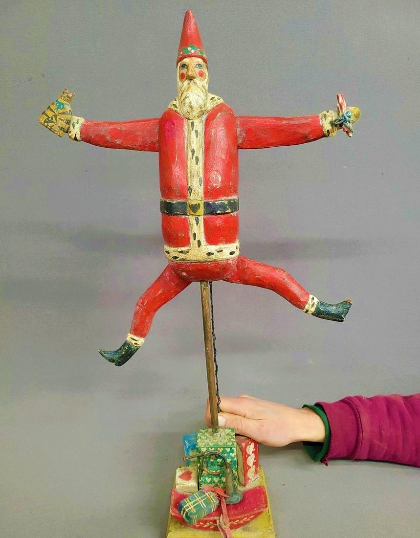 Signed Pam Schifferl carved Wooden Dancing Santa  - h 24" w 5" d 5.5"  - Good condition. Found in (1 of 2)