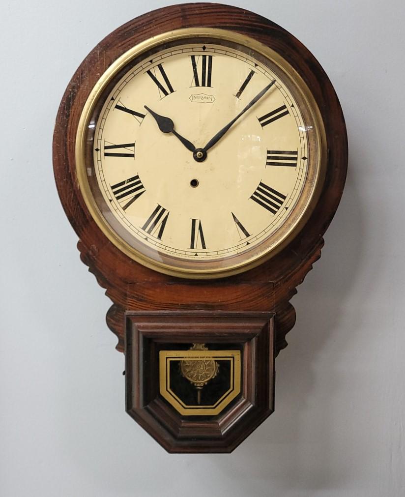 Circa 1870's Signed Ingraham Rosewood Wall Clock with original finish. Hgt 24" w 16" d 4.5". Good as (1 of 2)