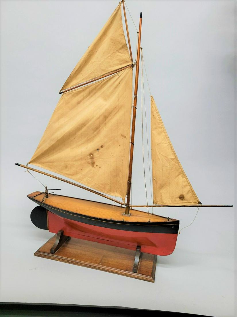 High Quality hand made wooden strip sailboat with all brass fittings.  Deck are all strip (1 of 5)