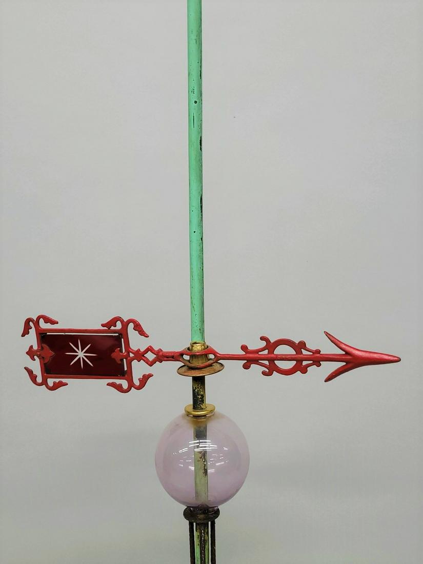 Circa 1900 Copper Lighting Rod with red cut glass in cast iron arrow with lavender glass ball .  Hgt (1 of 2)