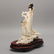82: A CARVED & PAINTED IVORY FIGURAL GROUP, Hgt.10 1/2"