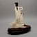 82: A CARVED & PAINTED IVORY FIGURAL GROUP, Hgt.10 1/2" - 5
