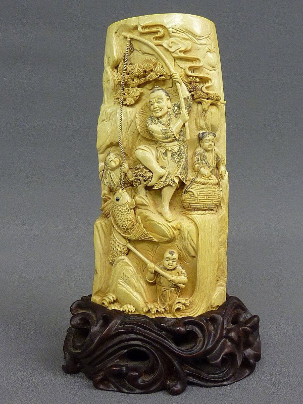 19th CENTURY CARVED TUSK with WELL CARVED SCENE OF: 19th CENTURY CARVED TUSK with WELL CARVED SCENE OF PEOPLE FISHING - Hgt. ivory only 8 1/4" total hgt. 10" - good condition