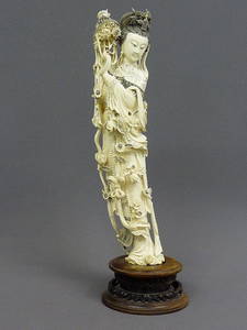 85: A CHINESE CARVED  IVORY FIGURE OF QUAN YIN, Hgt. 22