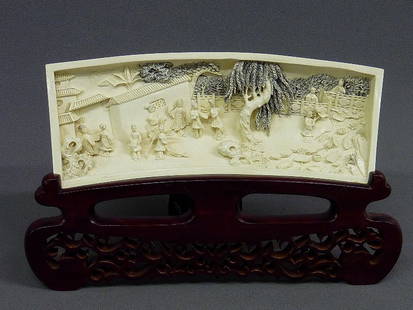 A CHINESE CARVED IVORY PLAQUE with VILLAGE SCENE wi: A CHINESE CARVED IVORY PLAQUE with VILLAGE SCENE with MANY PEOPLE, TREES & BUILDINGS , Ivory -Hgt. 4 1/2" W. 12 1/4" - Total Hgt 8 5/8"W 13 3/3" -19th/early 20th Century