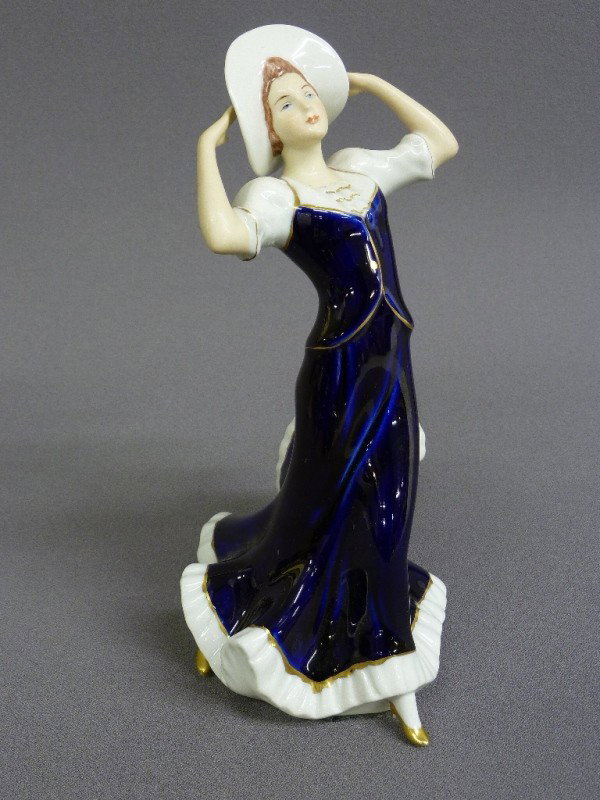 SIGNED ROYAL DUX PORCELAIN LADY WITH HAT, H 9 1/2": SIGNED ROYAL DUX PORCELAIN LADY WITH HAT, H 9 1/2" in cobalt & white, Circa 1920