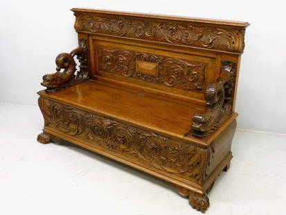 HEAVILY CARVED 1/4 CUT OAK RJ HORNER HALL BENCH wi: HEAVILY CARVED 1/4 CUT OAK RJ HORNER HALL BENCH with DOLPHIN and NORTHWIND CARVING - Circa 1880 - W 58" Hgt 40" D 21"- great condition