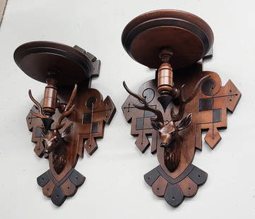 Circa 1870's Walnut Deer Head American wall sconces with black trim and shelves in the center. H 16": Circa 1870's Walnut Deer Head American wall sconces with black trim and shelves in the center. H 16" w 10" d 7". . Very good condition. Found in St Paul MN estate.