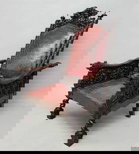 Circa 1880's Heavily Carved Oak Morris Chair with lions faces on the arms & bacchus the wine god on: Circa 1880's Heavily Carved Oak Morris Chair with lions faces on the arms & bacchus the wine god on the upper cresting. H 50" w 31" d 38" Very Good Original Condition. . Original finish with