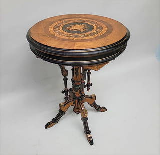 Circa 1875 Inlaid Walnut Black, Gold & Green renaissance revival high style American made table: Circa 1875 Inlaid Walnut Black, Gold & Green renaissance revival high style American made table with brass trim. Good solid condition with clean restoration. Found in St Paul MN estate. H.30", Dia.