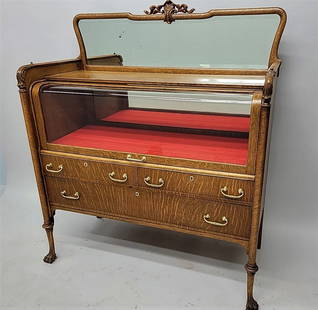 Circa 1900 Oak Claw Foot Curved Glass Crystal Cabinet with original cast hardware in refinished: Circa 1900 Oak Claw Foot Curved Glass Crystal Cabinet with original cast hardware in refinished very good condition. Unique design of display opening. Hgt 53" w 47" d 21". Found in St Paul MN.