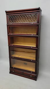 Circa 1900 5 high Signed Macy stacking bookcase with original leaded glass top section & rare mother: Circa 1900 5 high Signed Macy stacking bookcase with original leaded glass top section & rare mother of pearl & brass pulls on the doors. Hgt 72" width 34". D 12". Found in St Paul MN collection.