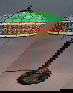 Signed Handel Circa 1920's Leaded Glass Table Lamp, Has Tiffany type wire work on the base. Great: Signed Handel Circa 1920's Leaded Glass Table Lamp, Has Tiffany type wire work on the base. Great orginal condition. All original. Hgt 19",. Shade dia. 16". Found in Chicago ILL estate.