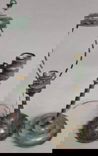 Two circa 1920's bronze lamp bases, the one on the left signed Handel with original Hubbel socket: Two circa 1920's bronze lamp bases, the one on the left signed Handel with original Hubbel socket with acorn pull, h 15" dia. 5" the one on the right old bronze base socket signed (Paisti). H