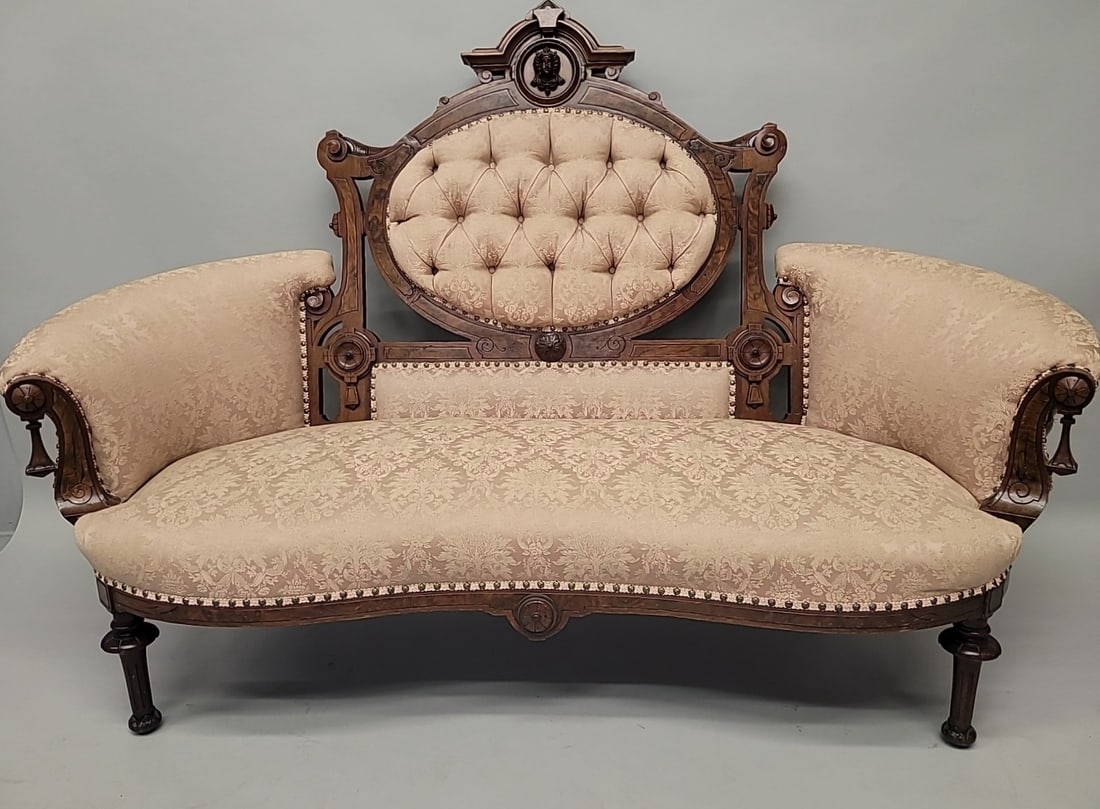 Circa 1875 Burl Walnut renaissance revival loveseat with portrait womans head of cresting: Circa 1875 Burl Walnut renaissance revival loveseat with portrait womans head of cresting with good carved & burled design through out. H 49" w 72" d 33". Solid condition with some cat scratching on b