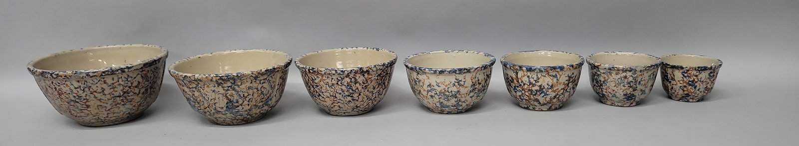 Circa 1920 Nest of Seven Red Wing Spongeware  Paneled Stoneware Bowls going largest to smallest. (1 of 10)