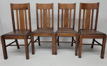 Circa 1900 Solid 1/4 cut oak arts & crafts dining chairs with original leather seats. Signed on seat (1 of 4)