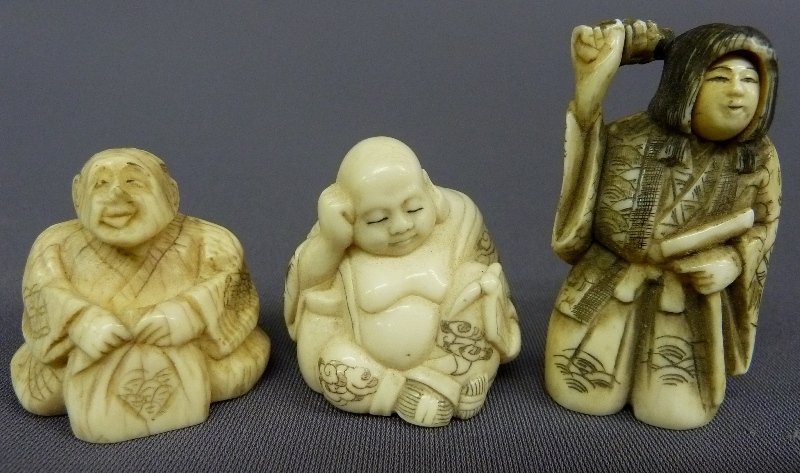 THREE CARVED ELEPHANT IVORY NETSUKES, TWO ARE SIGN: THREE CARVED ELEPHANT IVORY NETSUKES, TWO ARE SIGNED, heightest 2" width 1.25" - good condition