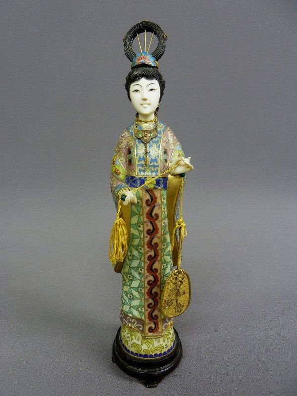 A FINE 13.5" CHINESE CLOISONNE WOMAN with CARVED EL: A FINE 13.5" CHINESE CLOISONNE WOMAN with CARVED ELEPHANT IVORY FACE & HANDS Holding A Fan wearing a enameled necklace with enameled headpiece -1st 1/2 20th Century - Hgt 13.5" Width 3"- good conditio