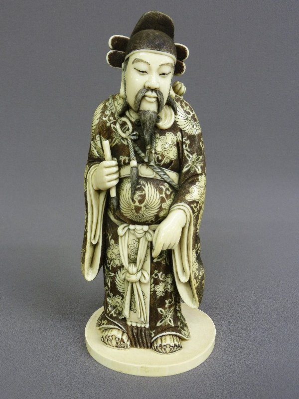 Heavy Chinese Carved Ivory-God of Literature, 1st: Heavy Chinese Carved Ivory-God of Literature, 1st 1/2 20th cent., dressed in brocade robe & official cap w/sword, holding a calligraphy brush, height 12.25" width, very heavy 5.25 wgt 5 lbs or 2kgs