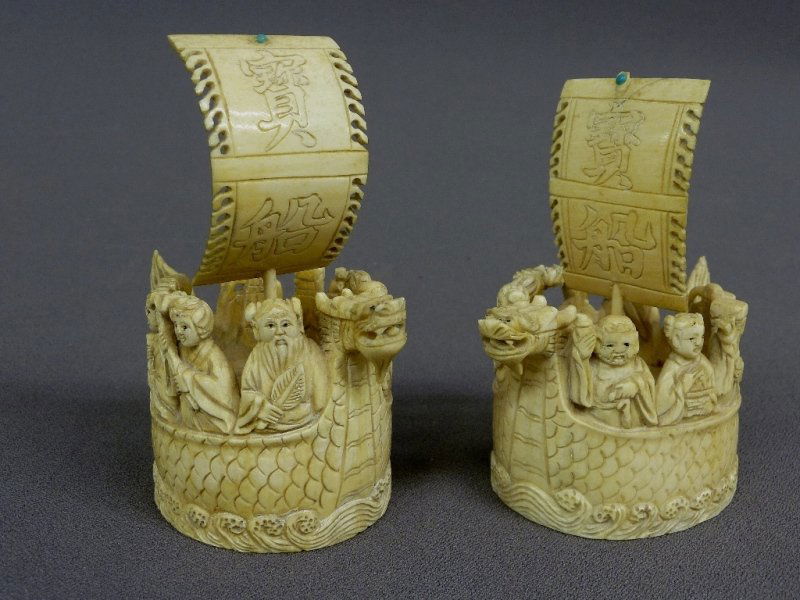 PAIR OF CHINESE HAND CARVED ELEPHANT IVORY DRAGON: PAIR OF CHINESE HAND CARVED ELEPHANT IVORY DRAGON BOATS w/immortals & sails, height 4",width 4" depth 2.25", 1st quarter 20th century