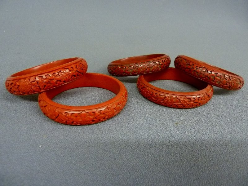 One Pair and A Set of 3 Chinese Cinnabar Lacquer: One Pair and A Set of 3 Chinese Cinnabar Lacquer Bracelets, can be worn individually or forming a fashionable cuff style ensemble - outside dia. 3.25" inside 2.5"