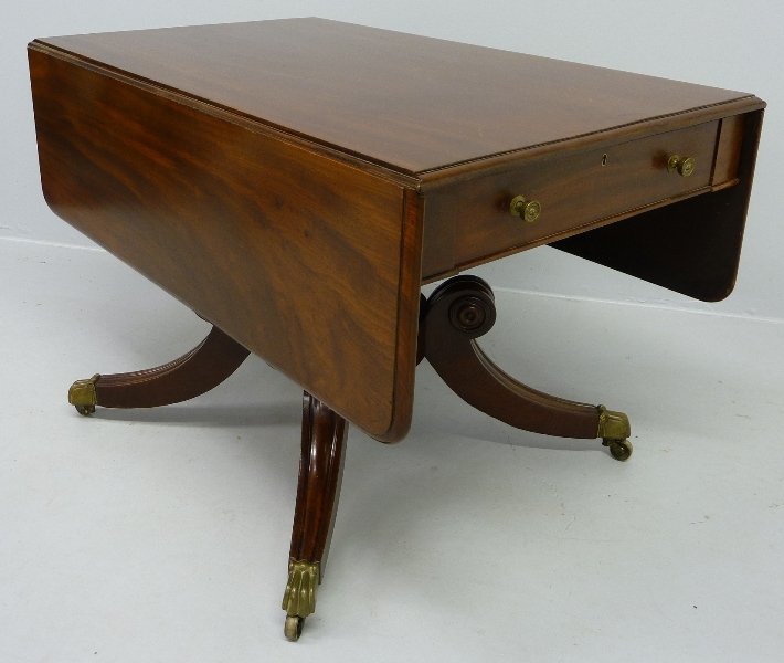 OLD GROWTH MAHOGANY ENGLISH REGENCY ( circa 1810: OLD GROWTH MAHOGANY ENGLISH REGENCY ( circa 1810- 1840) DROP LEAF TABLE with Brass Feet and castors plus a drawer on each end - very dense quality wood - height 28.5" width 44" with leaves up 52" - go