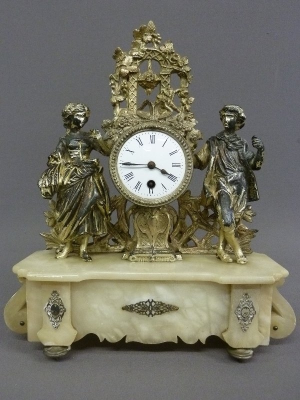 Circa 1880 CAST METAL & ONYX FIGURAL STATUE CLOCK: Circa 1880 CAST METAL & ONYX FIGURAL STATUE CLOCK of 18th Century Man & Woman - height 16.5" width 14.5" depth 4.5"