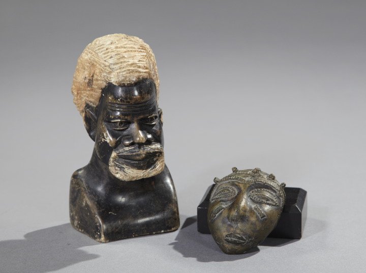 Group of Two African Objects 20th Century Objects,: Group of Two African Objects 20th Century Objects, one a Carved Stone elder Hgt 6 1/2" w 3 1/4" plus a miniature Brass Face Mask - h 3 1/2" w 2 3/8" - good condition
